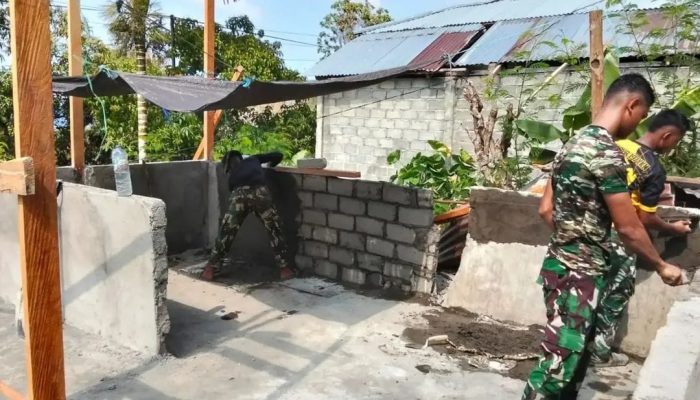 Progres RTLH 1 Capai 24 Persen, Satgas TMMD ke-130 Kodim 1301/Sangihe Lanjutkan Plesteran Dinding Rumah